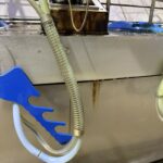 Milking Cluster Pipe Management Spring